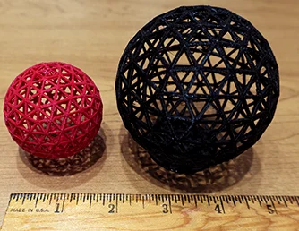 Two 3D-printed spherical objects